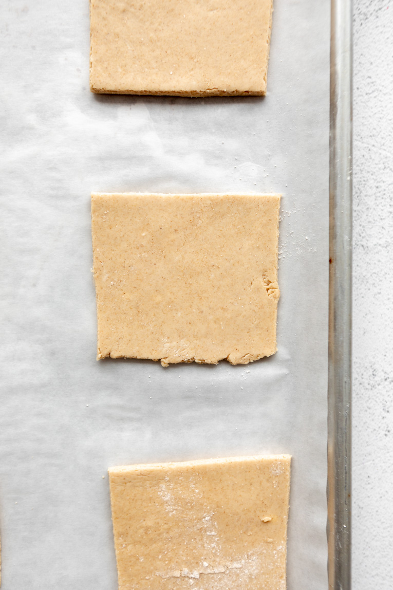 Gluten-free pastry dough cut into squares for pop tarts.