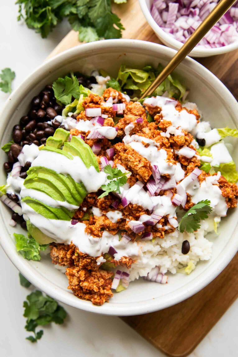 Sofritas recipe in a bowl with rice and beans.
