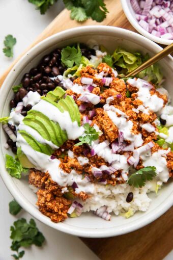 Sofritas Meal Prep Bowl with avocado, cilantro, and sour cream.