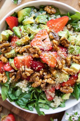 Close up of Avocado Strawberry Spinach Salad recipe.