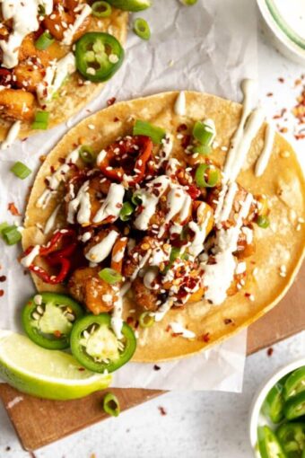 Kung Pao Shrimp Tacos with a creamy jalapeño Sauce recipe.