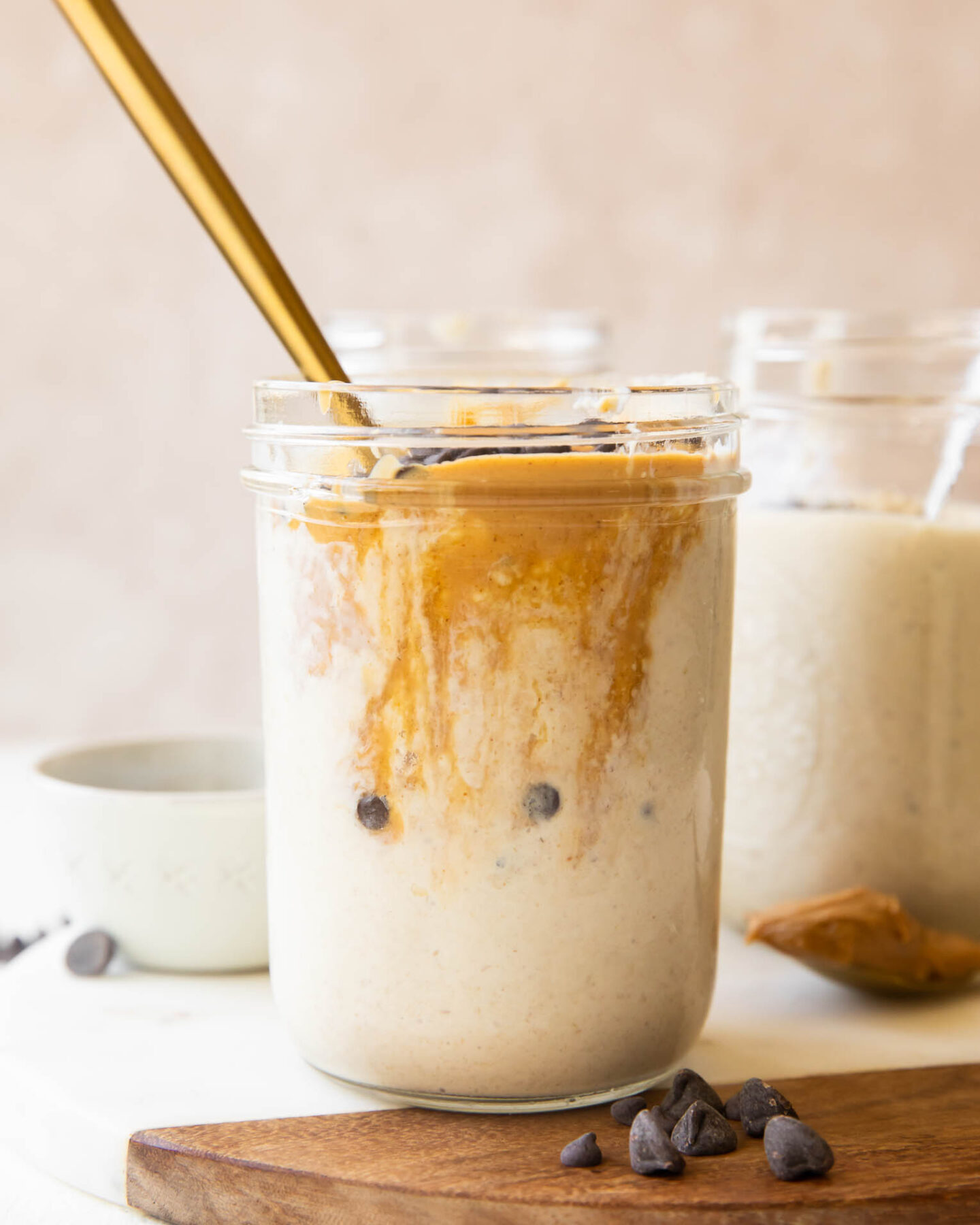 Blended Overnight Oats recipe in a jar with a spoon.
