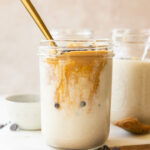 Blended Overnight Oats recipe in a jar with a spoon.