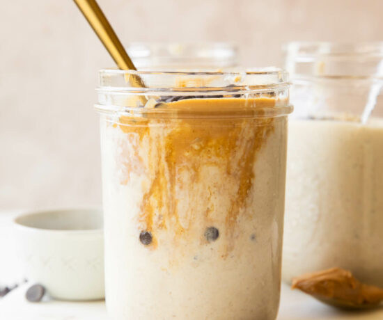 Blended Overnight Oats recipe in a jar with a spoon.