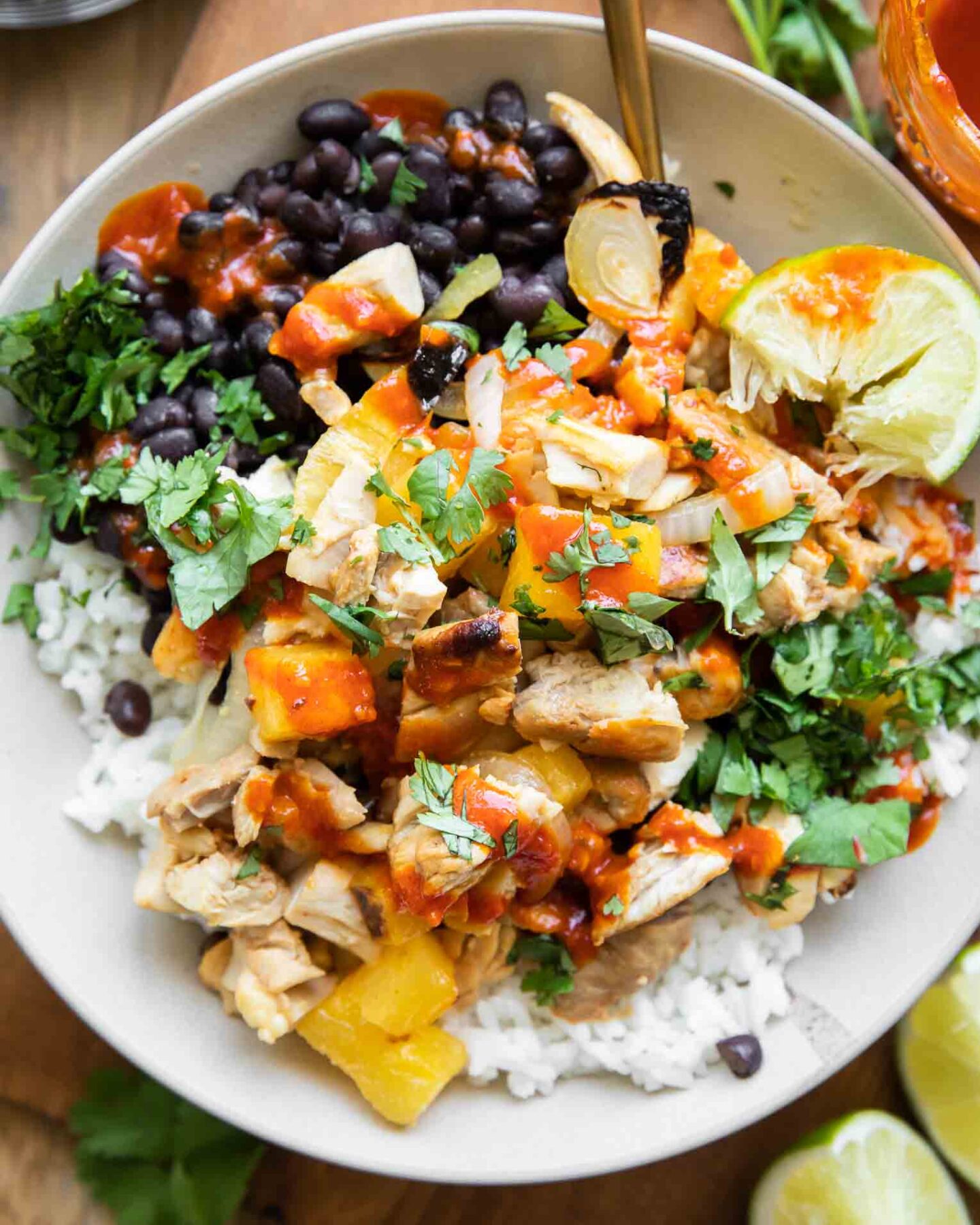 Al pastor chicken recipe in a meal prep bowl.