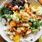 Al pastor chicken recipe in a meal prep bowl.