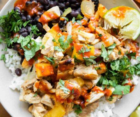 Al pastor chicken recipe in a meal prep bowl.