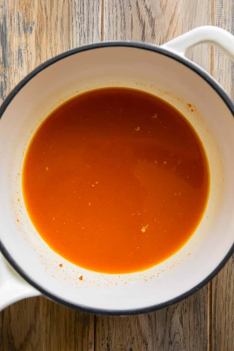 Sauce being boiled for Chicken Al Pastor Bowls.