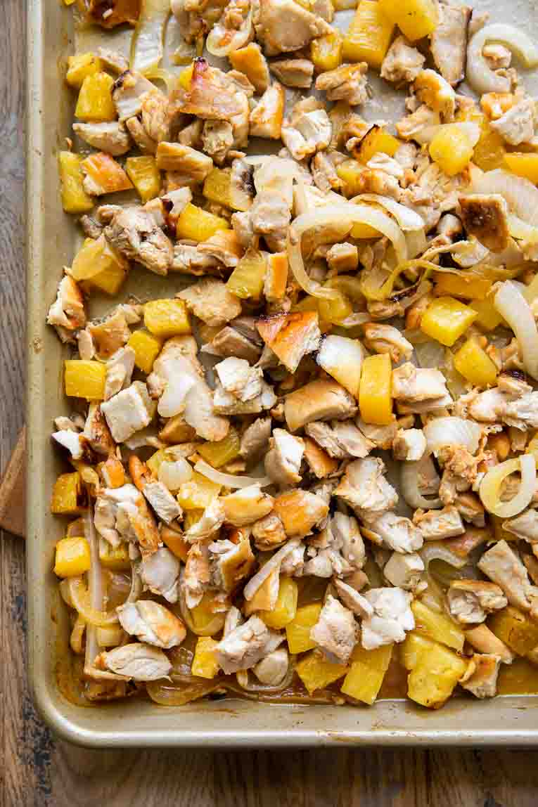 Chicken Al Pastor recipe baked on a sheet pan.