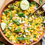 Chipotle Corn Salsa Recipe in a bowl with lime.