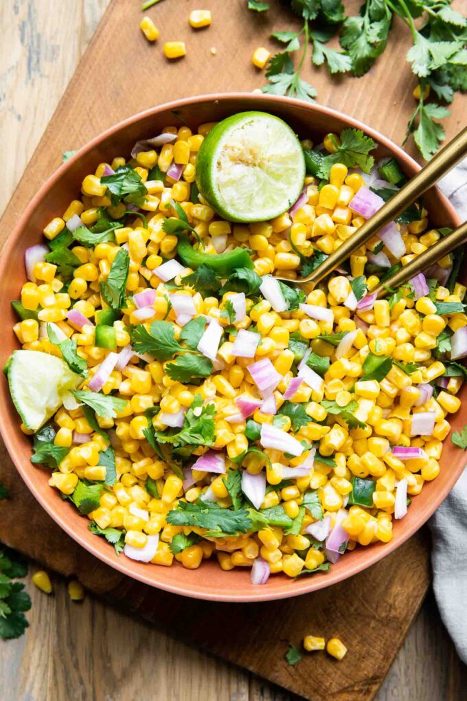 Chipotle Corn Salsa Recipe in a bowl with lime.