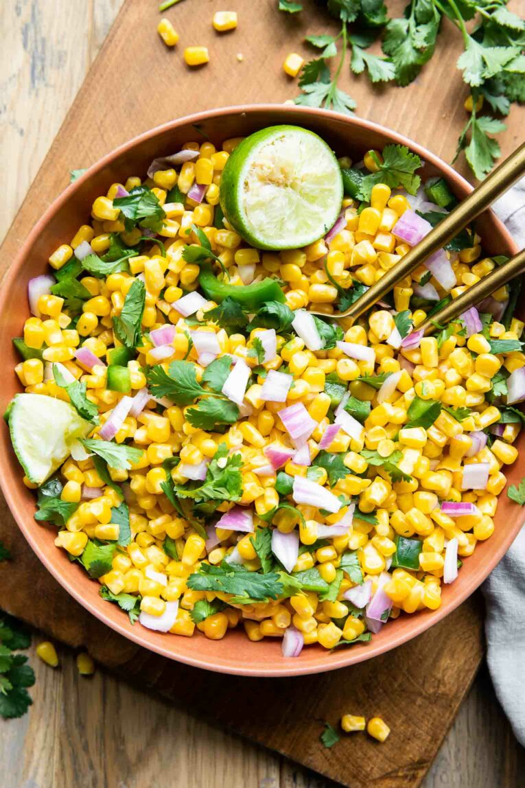 Chipotle Corn Salsa Recipe in a bowl with lime.