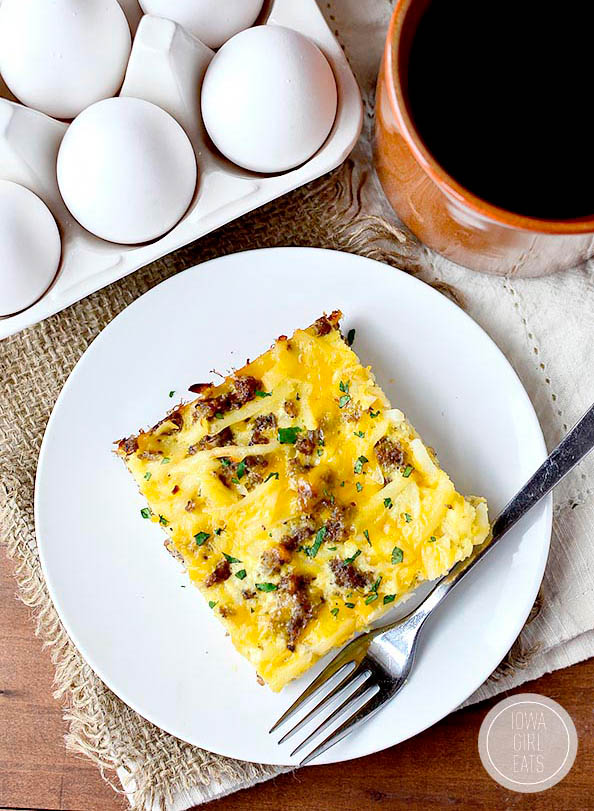 Gluten-free breakfast casserole on a plate with a fork.