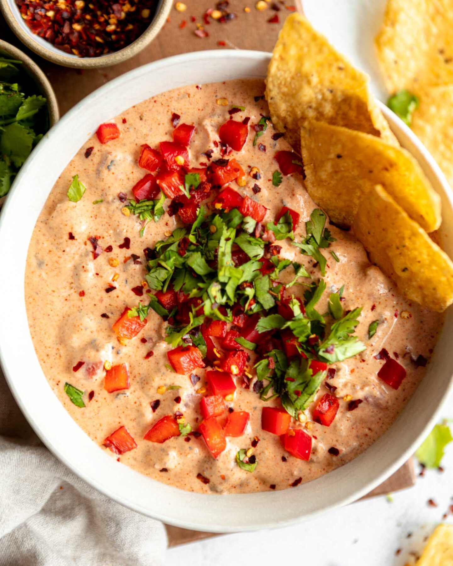 Healthier Rotel Dip in a bowl with tortilla chips.