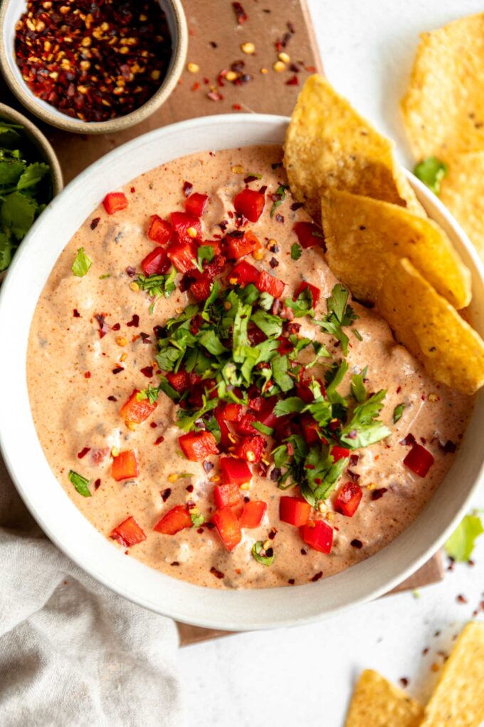 Healthier Rotel Dip in a bowl with tortilla chips.