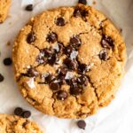 Top shot of Vegan Peanut Butter Cookie on parchment paper.