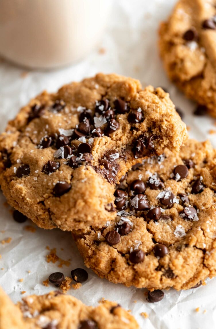 Stacked Vegan Cookies with a bite taken out.