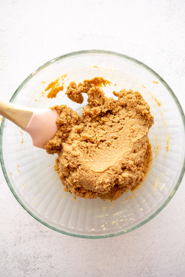 Vegan cookie dough with peanut butter mixed in a bowl.