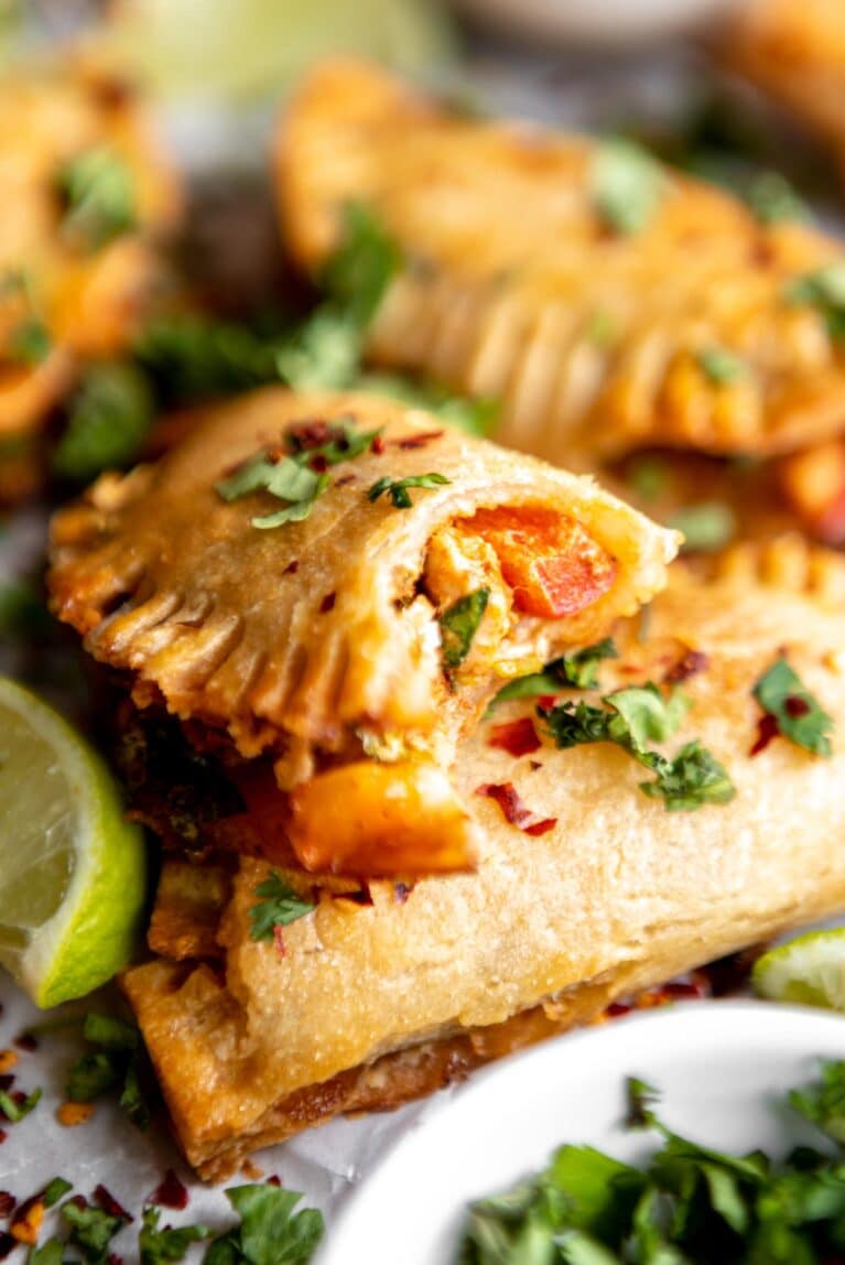 Chicken Empanadas recipe with bite taken out.
