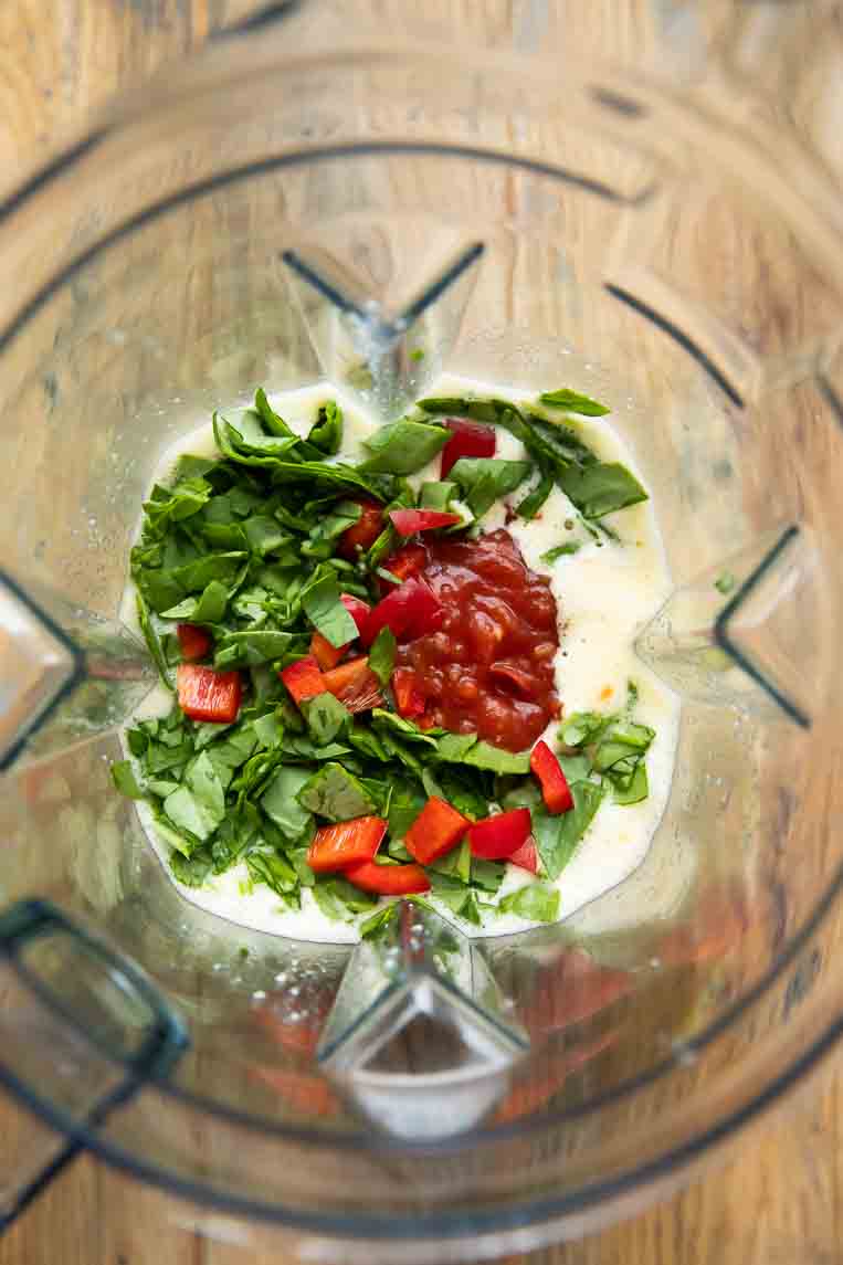 Blended eggs and cheese with spinach and bell peppers.