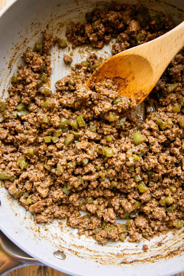 Taco seasoning ground beef in skillet.