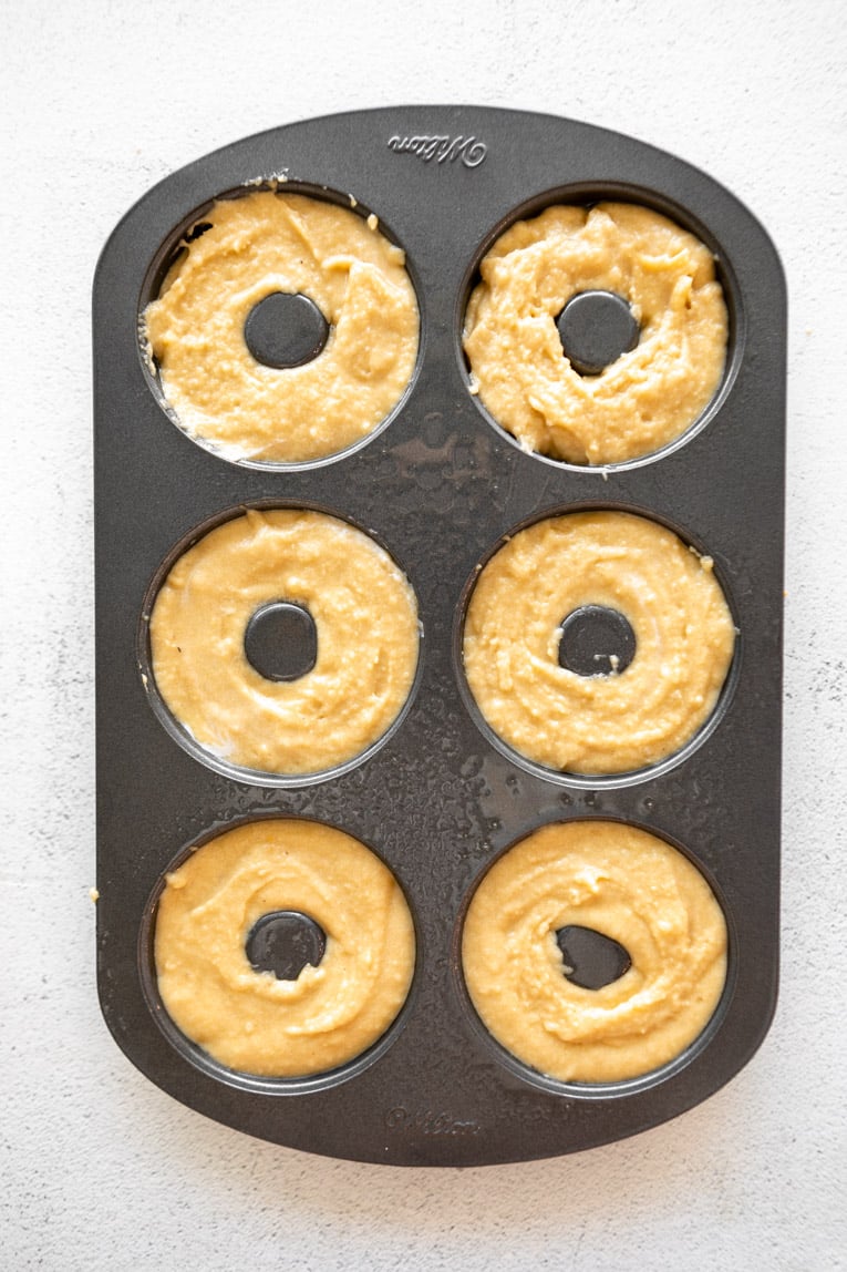 Protein Donut dough in a donut pan.