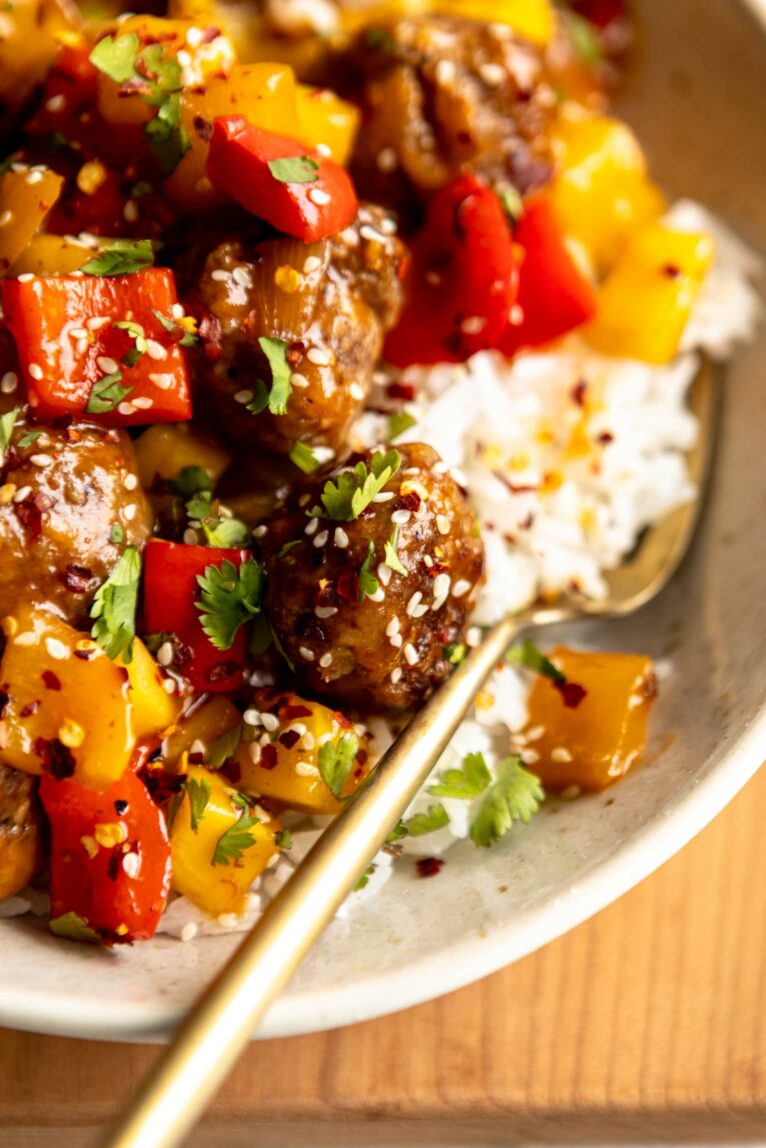 Close up of sweet & sour meatballs.