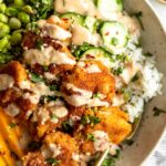 Top shot close up of Fried Shrimp Bowl with rice and veggies.