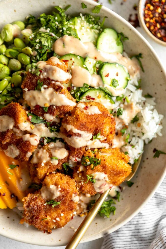 Top shot close up of Fried Shrimp Bowl with rice and veggies.