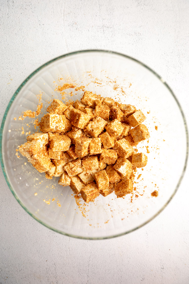 Tofu coated in seasoning and breadcrumbs.