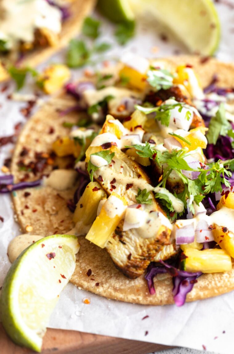 Close up angle of Jerk Chicken Taco with pineapple salsa.