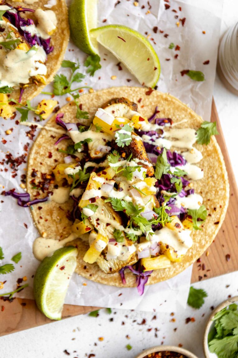 Jerk Chicken Tacos with lime and pineapple salsa.