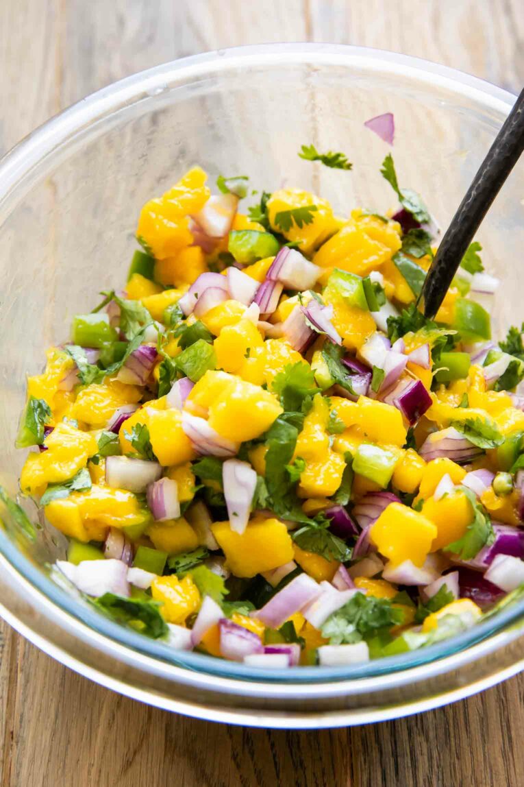Angled photo of Mango Salsa Recipe in a large bowl.