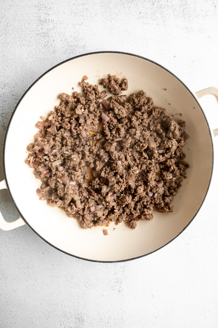 Lean ground beef being cooked.