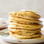 Close up of Gluten-Free Pancakes stacked on a plate.