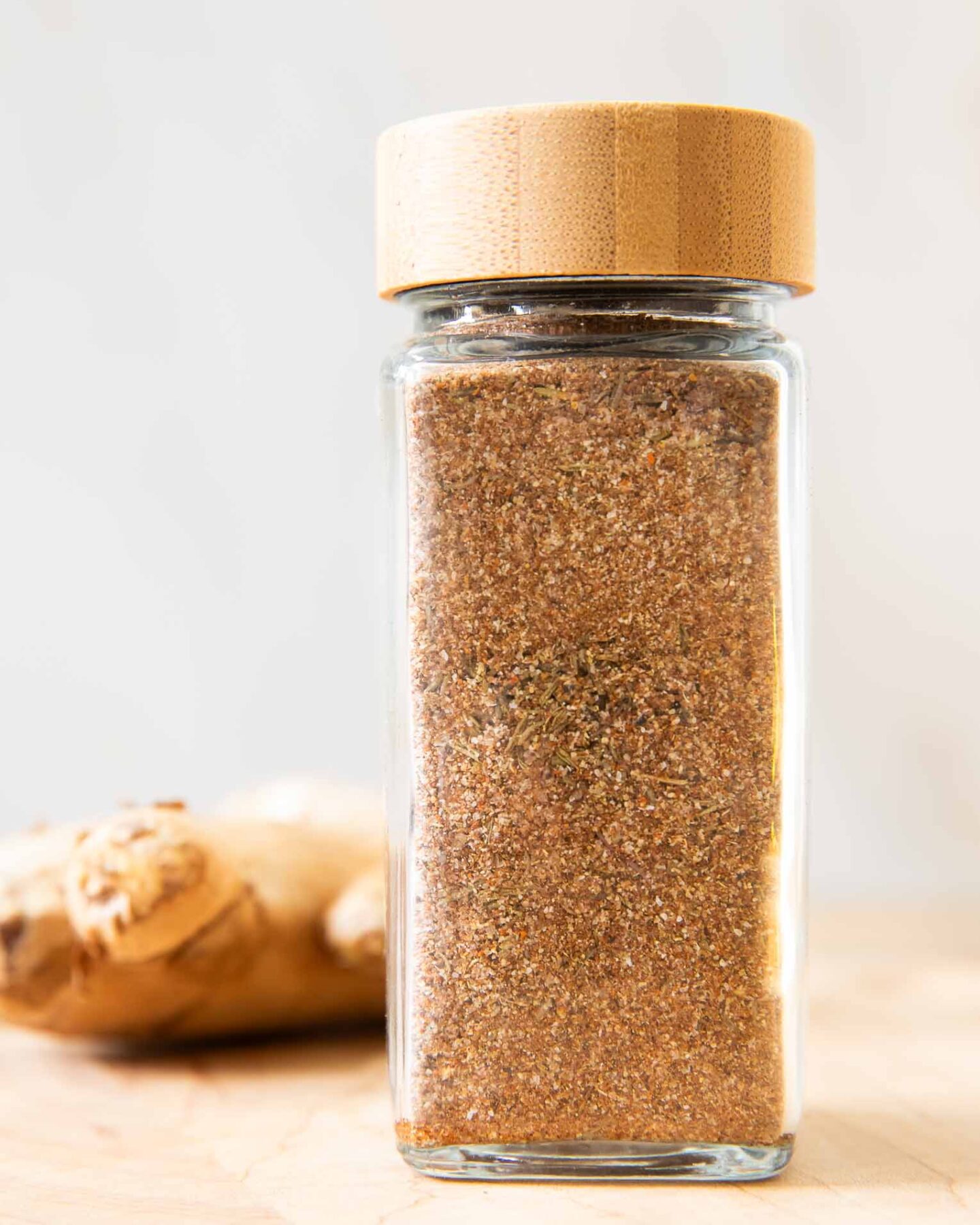 Close up Jerk Seasoning in a spice jar.