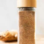 Close up Jerk Seasoning in a spice jar.