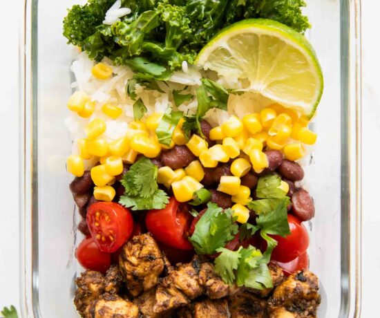Meal Prep Southwest Chicken Burrito Bowl in a container for lunch idea.