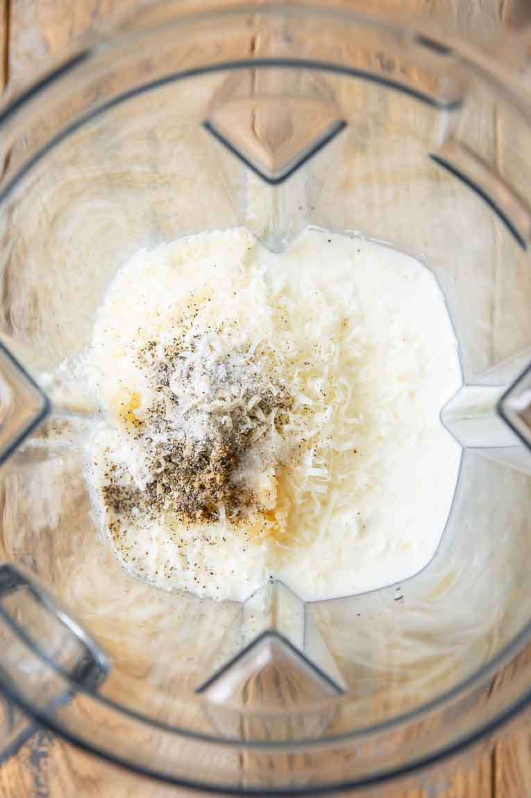Ingredients for cottage cheese pasta sauce in a blender.