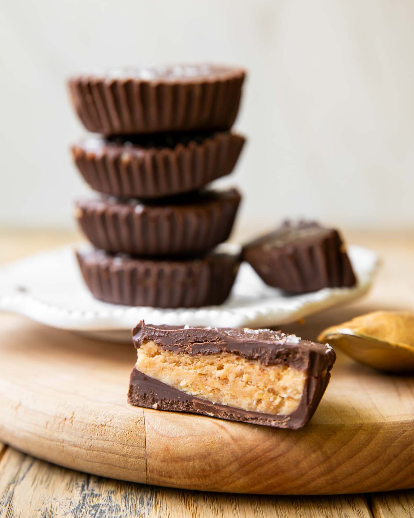 Across photo of healthy peanut butter cups stacked.