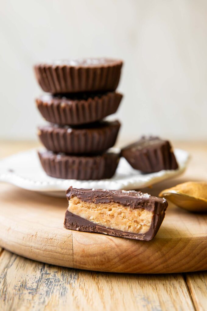 Across photo of healthy peanut butter cups stacked.