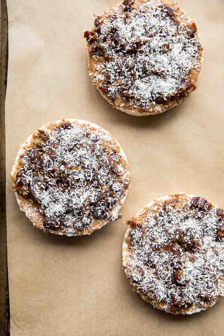 Almond butter, chopped dates, and shredded coconut over rice cakes.