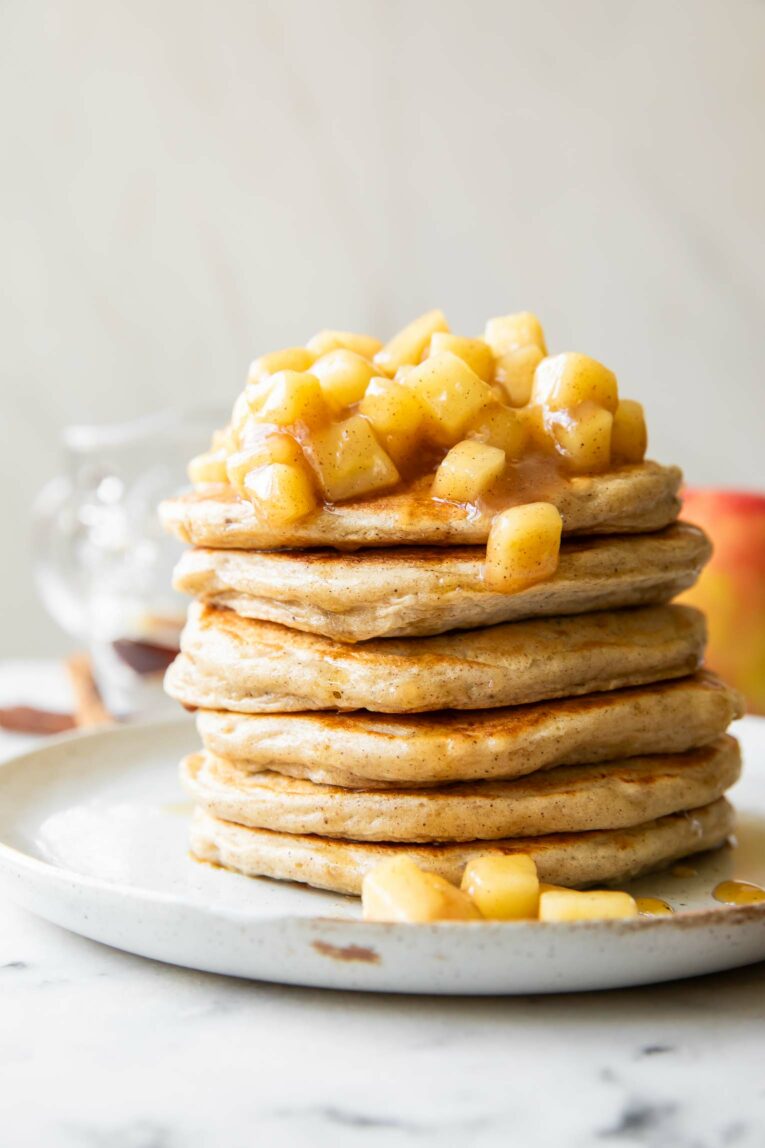 Across shot photo of stack of Apple Pie Protein Pancakes.