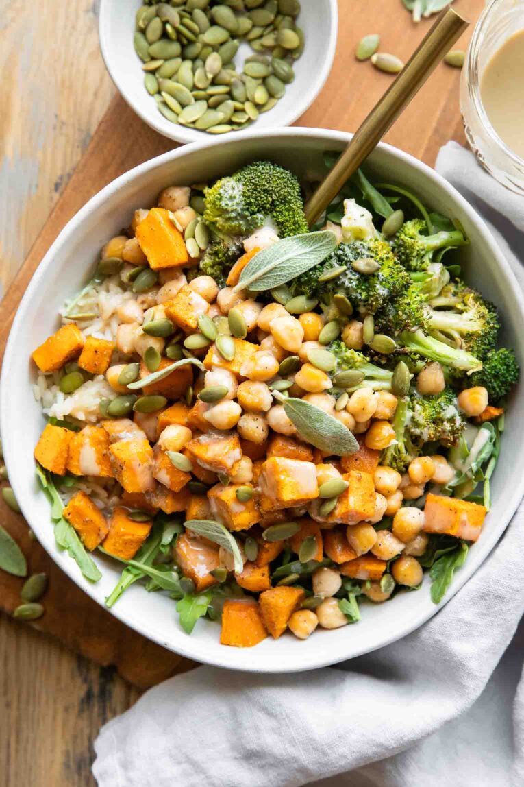 Top shot Chickpea Sweet Potato Bowl with tahini sauce.