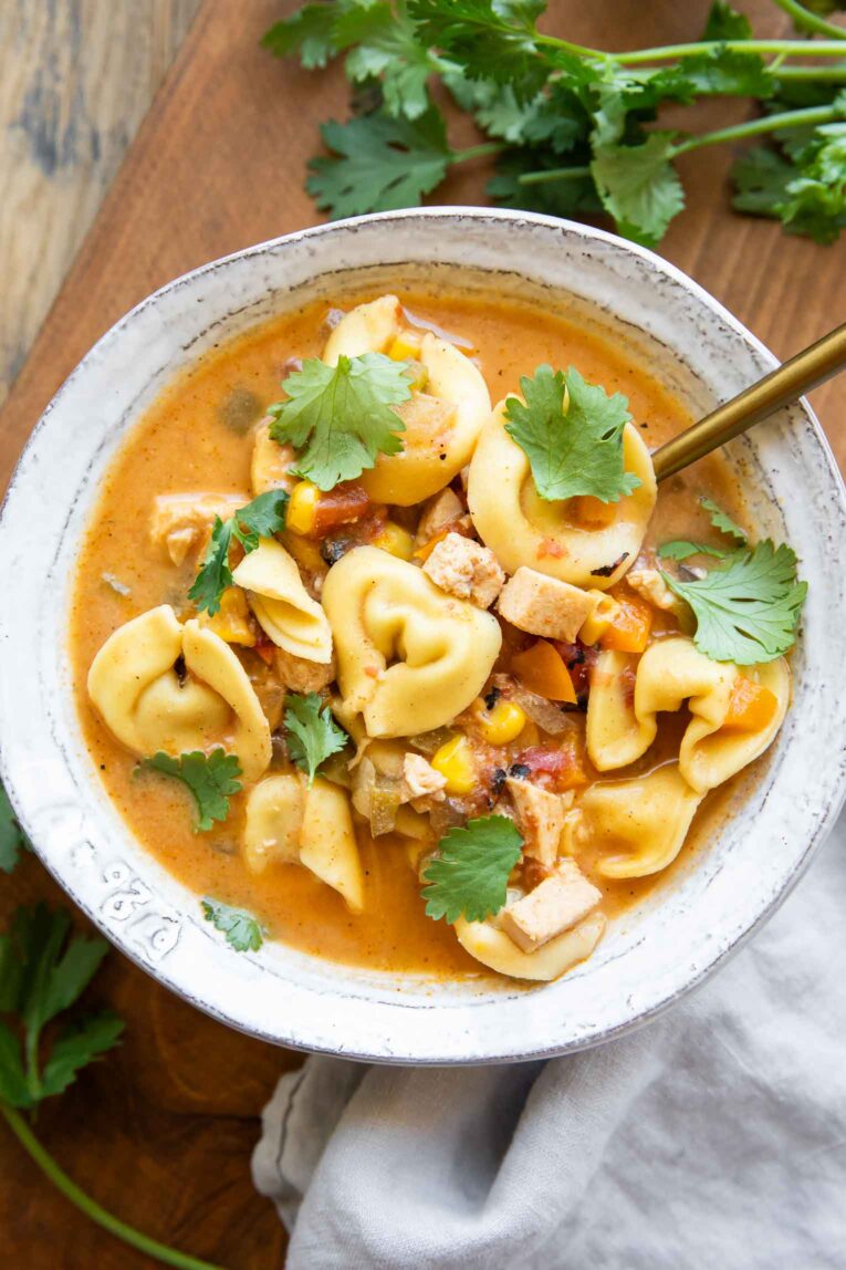 Southwest Tortellini soup in a bowl with cilantro.