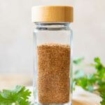 Homemade Fajita Seasoning Recipe in a spice jar.