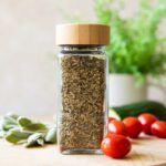 Close up of Greek Seasoning with tomatoes and sage.