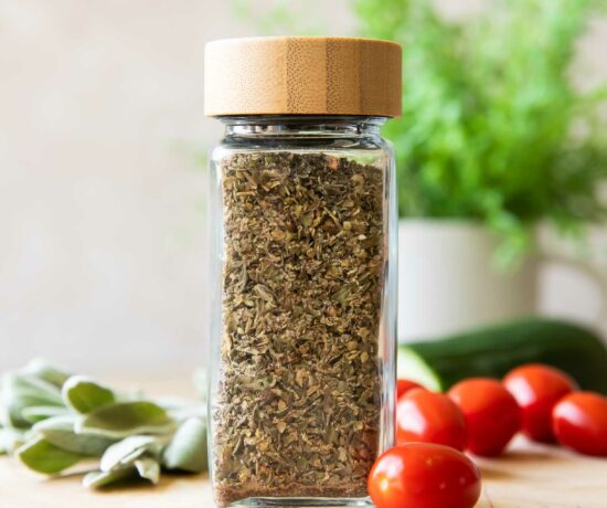 Close up of Greek Seasoning with tomatoes and sage.