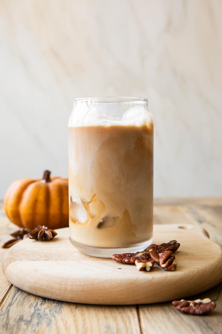 Oatmilk over espresso with pecan syrup.