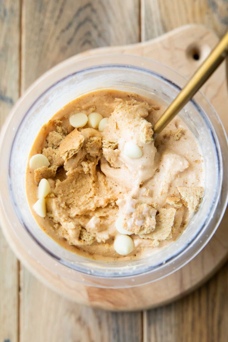 Top shot of pint container with healthy pumpkin ice cream and mix ins.